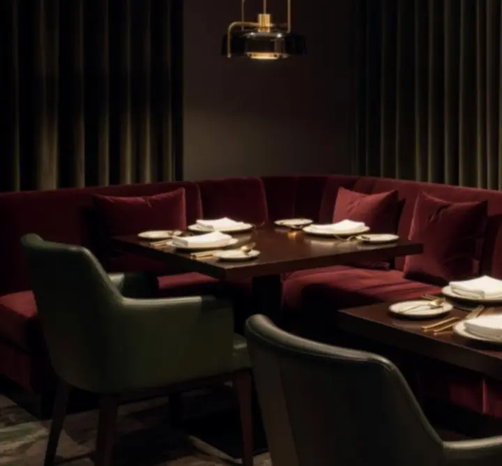 Chic dining room at Bella Australia with lounge-style seating and atmospheric lighting
