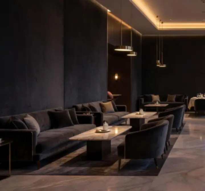 Cinematic interior of Bella Australia with warm gold lighting, deep burgundy accents and elegant seating