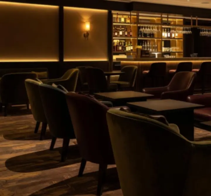 Luxurious lounge seating and dramatic lighting inside Bella Australia.